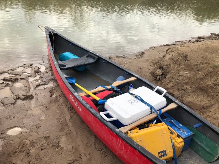 Canoe at river's edge